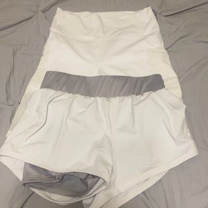 White biker shorts and white running shorts with grey liner.